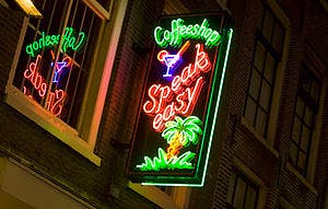 English: A view of a neon sign of a cannabis c... English: A view of a neon sign of a cannabis c...